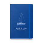 Catalina 34 ship's log with a line drawing of the boat on the Blue cover