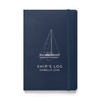 Catalina 34 ship's log with a line drawing of the boat on the Navy cover