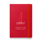 Catalina 34 ship's log with a line drawing of the boat on the Red cover