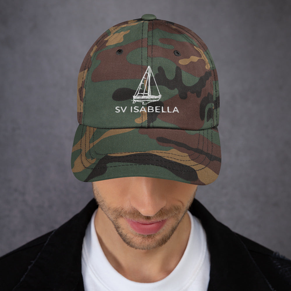 Custom sailboat dad hat in Green Camo with an embroidered line drawing of a Catalina 27 and the boat name SV ISABELLA